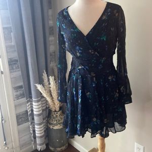 Anthropologie dress, dark floral print. Rushed at waste. Long sheer sleeves.